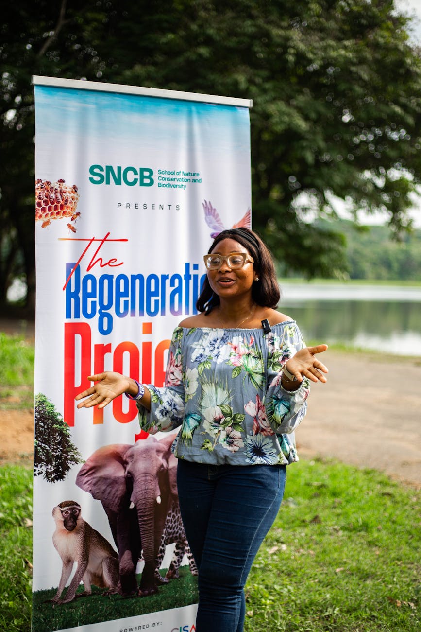 woman presenting at outdoor environmental event